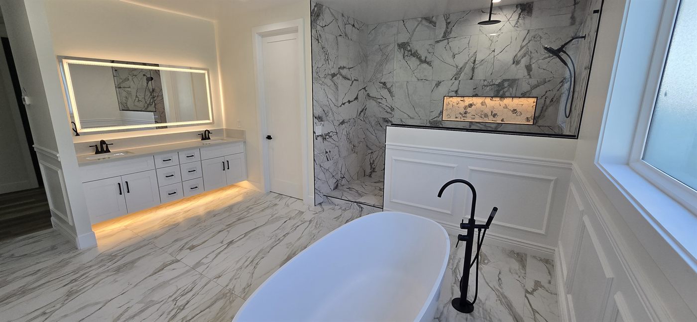 Remodeled bathroom with freestanding tub