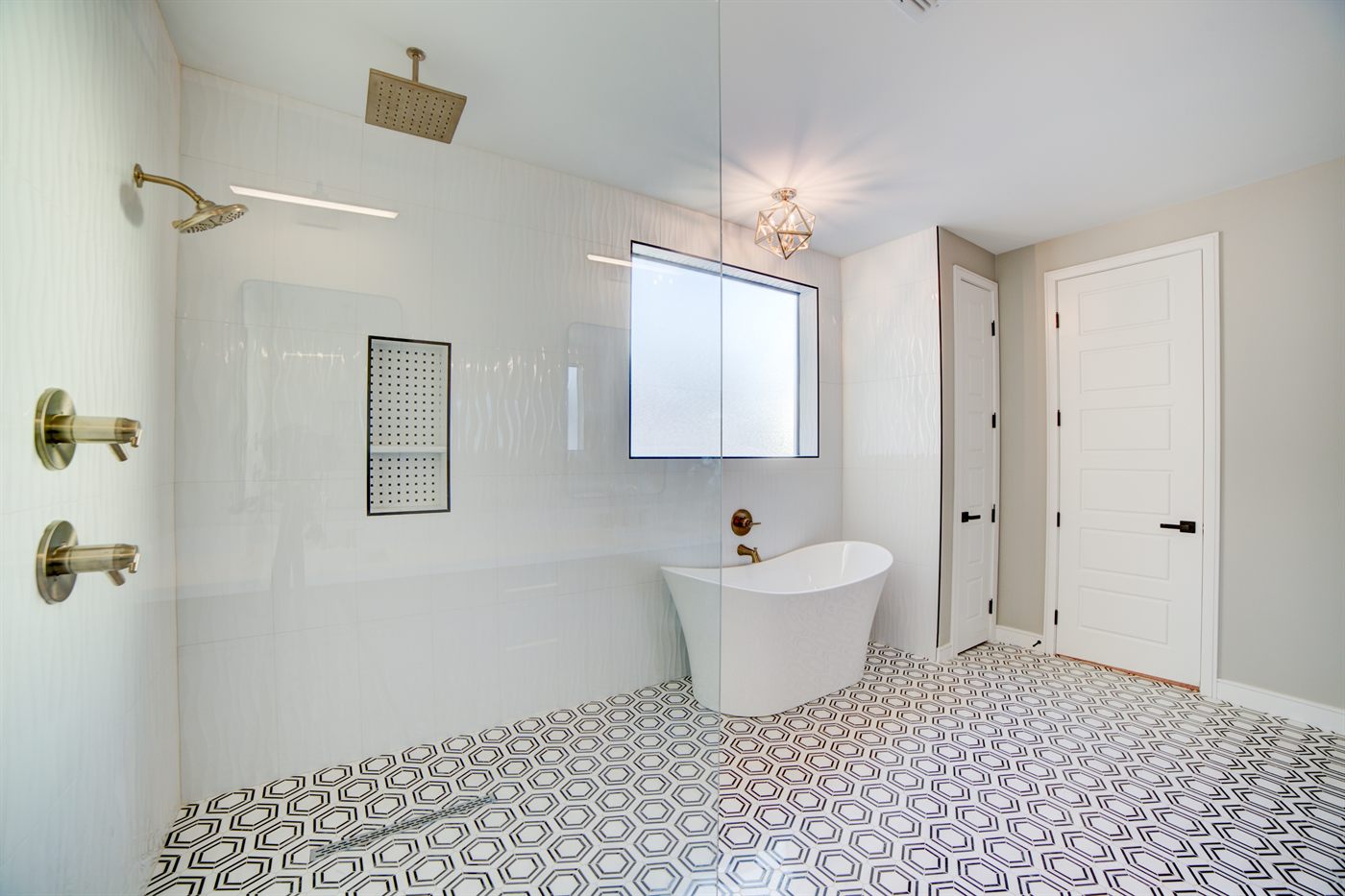 Full bathroom remodel with tile surround